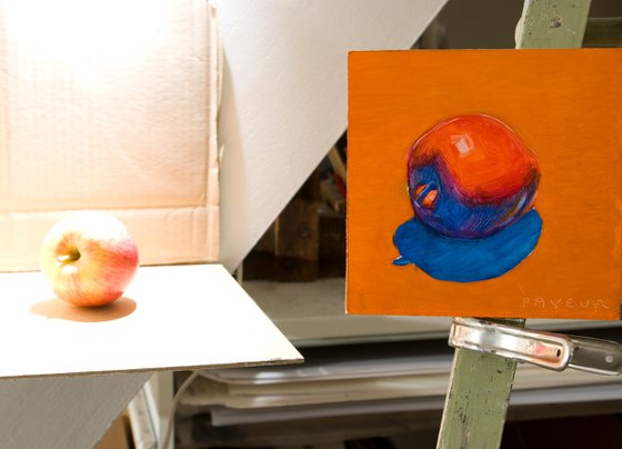 pop red blue apple on orange