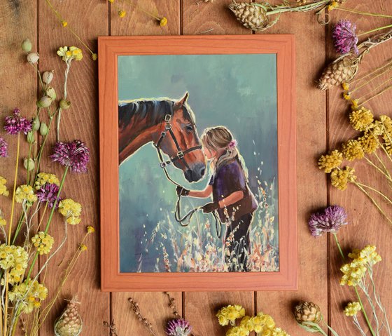 Girl kissing a brown horse