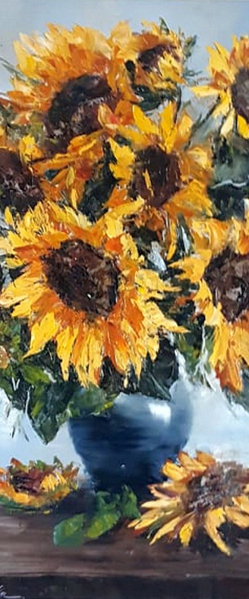 Sun flowers in blue vase by Olga Egorov