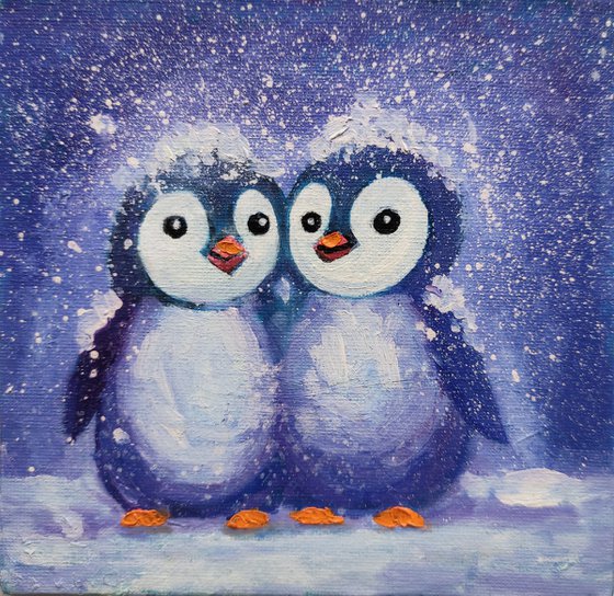 Two penguins painting