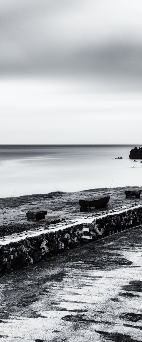 Benches on the road along the west coast by Karim Carella