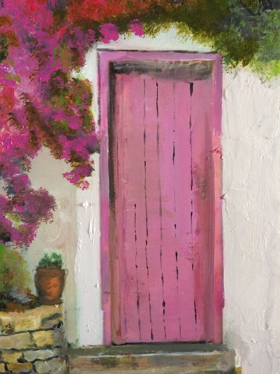 Mediterranean House with Pink Flowers