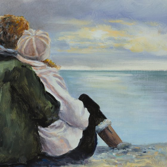 Couple in a cloudy seascape