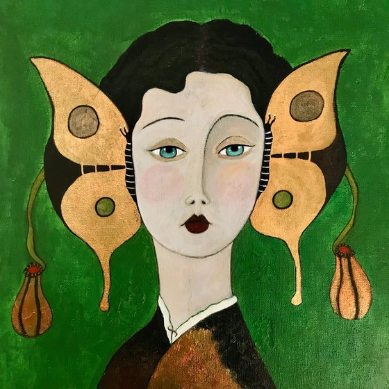 Woman with golden butterflies