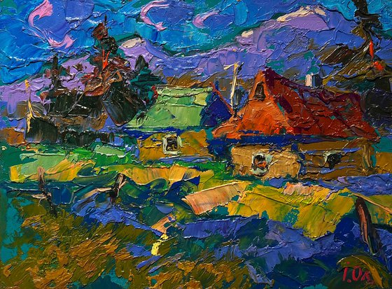 Village and blue mountains