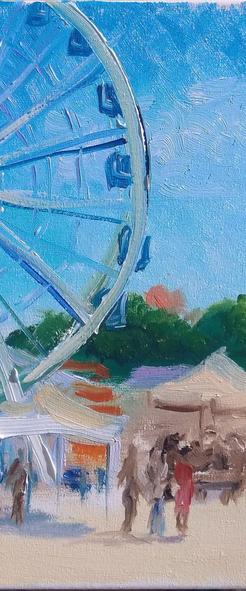 City square with a Ferris wheel and the city festival. Pleinair painting by Dmitry Fedorov