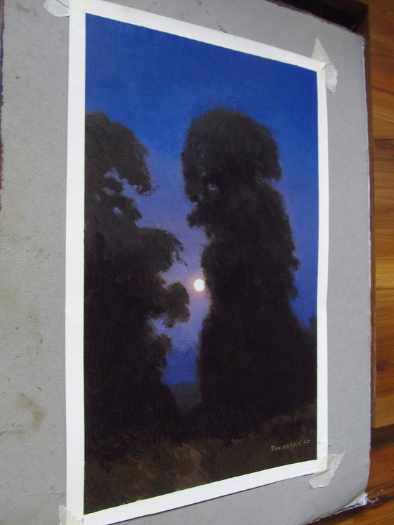 Moonrise through trees