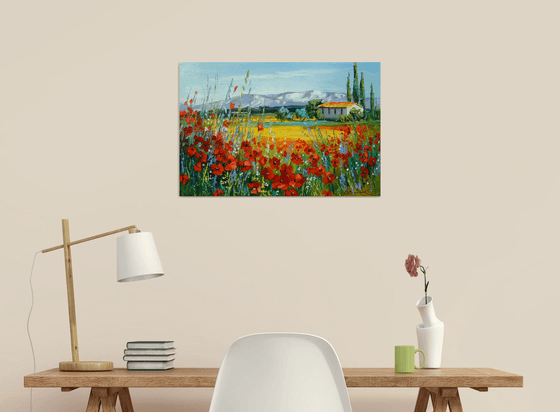 Poppy field near the mountains