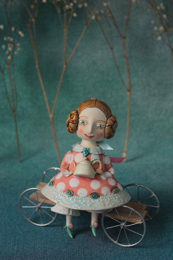 Little Girl with a teapot. Hanging sculpture, bell doll by Elya Yalonetski