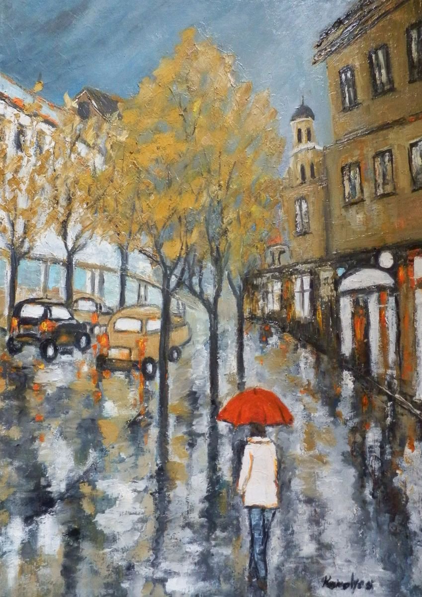 A woman with a red umbrella by Maria Karalyos