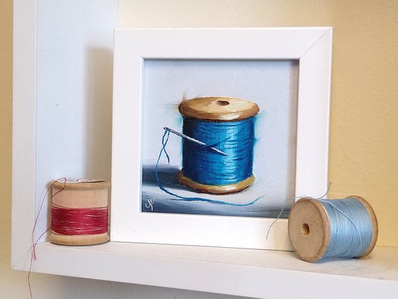 Little blue  cotton reel still life