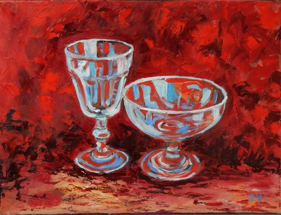 Wine glass on red.