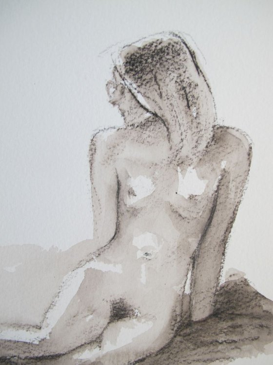 seated female nude