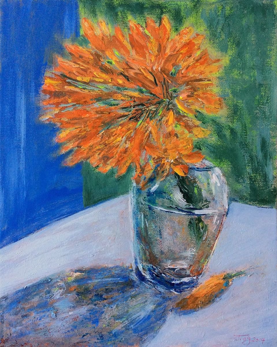 Kaffir lily in a glass vase by Jing Tian