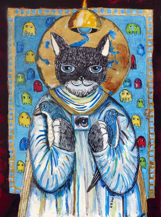 The cat god against a carpet.
