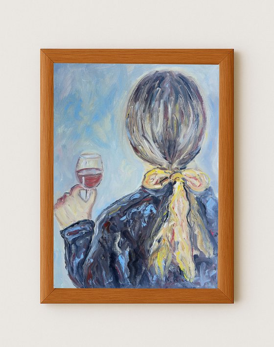 A Woman Holding a Glass of Wine