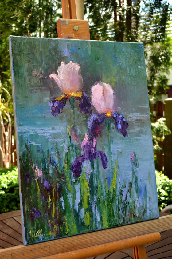 Three Irises by the pond