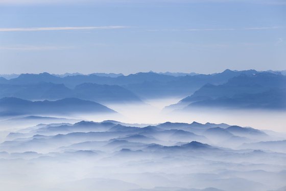mountains covered with fog