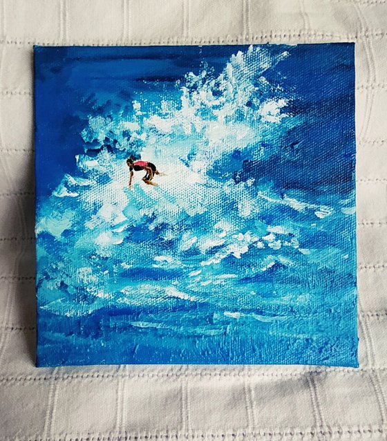 Surfing in the sea
