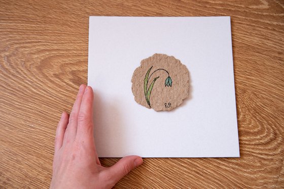 Snowdrop drawing on the author's craft paper