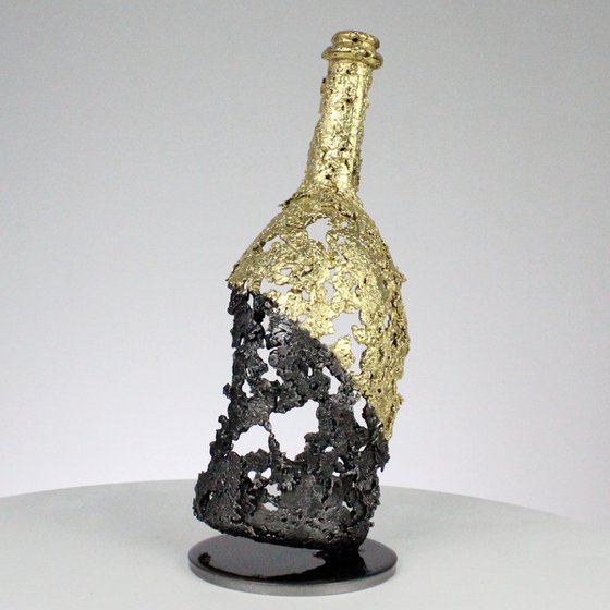 CLXXV bottle - Ruinart champagne bottle sculpture in gold steel