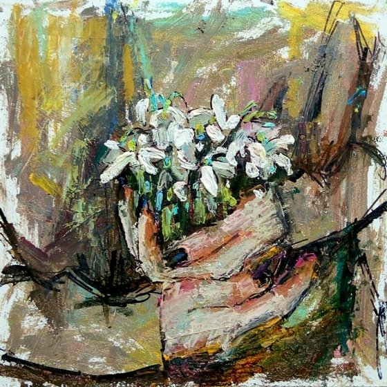 Snowdrops in hands