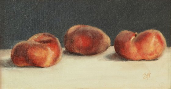 Three Flat Peaches
