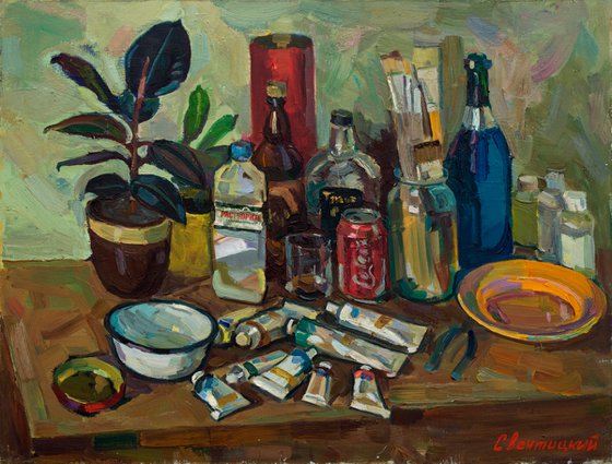 Still life with paints and  ficus