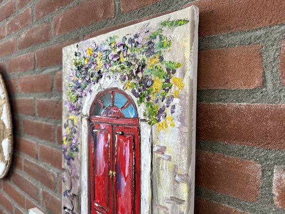 Red door with flowers