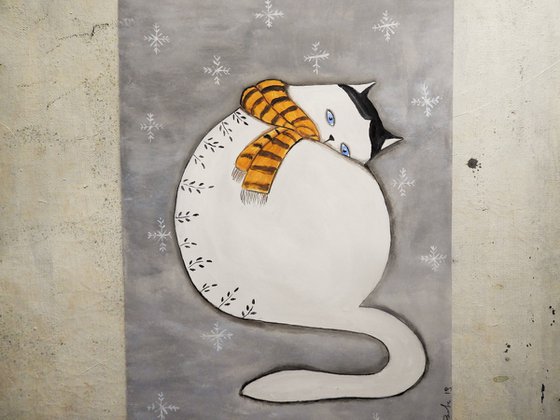 The cat in the winter