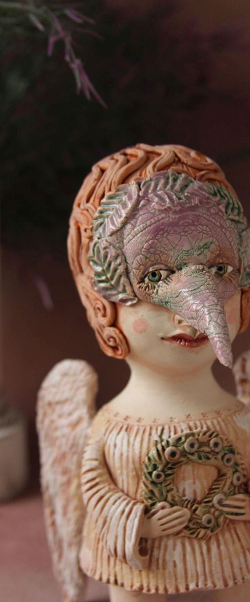 Angel holding a wreath. Ceramic OOAK sculpture. by Elya Yalonetski