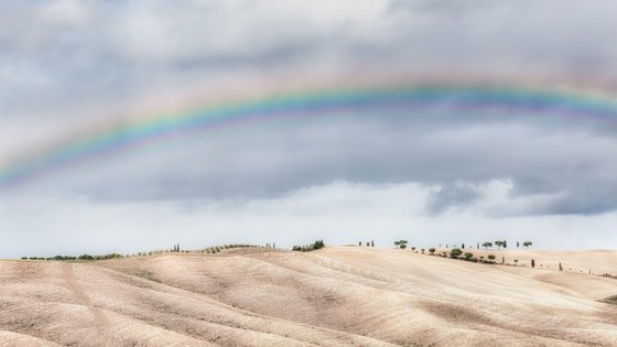 Rainbow over the tuscan hills