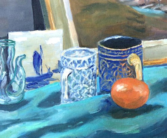 Still Life of a glass jug, some pots, a ceramic tile and a tangerine. Oil Painting