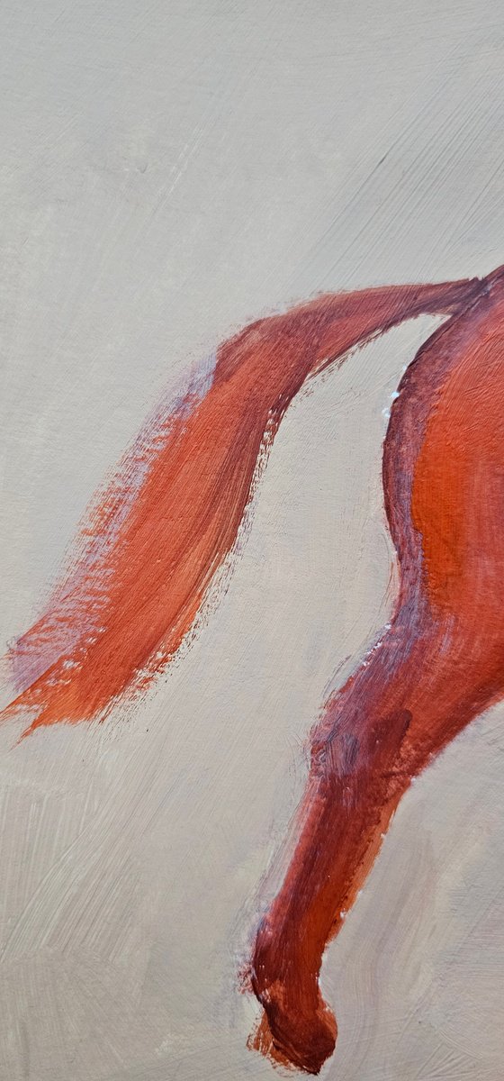 Jumping orange horse