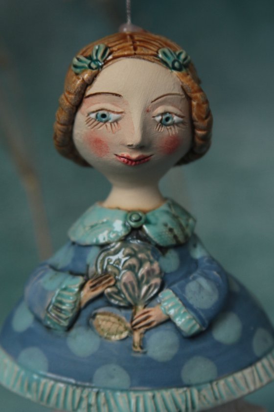 Little Girl in tender blue dress. Hanging sculpture, bell doll by Elya Yalonetski