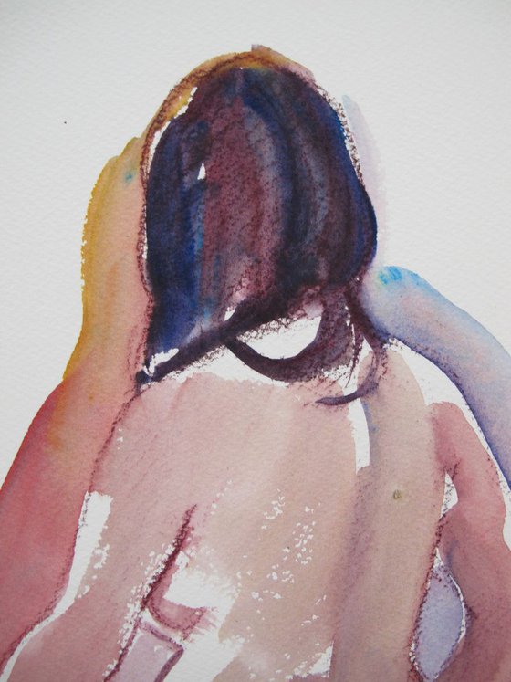 Seated female nude back view