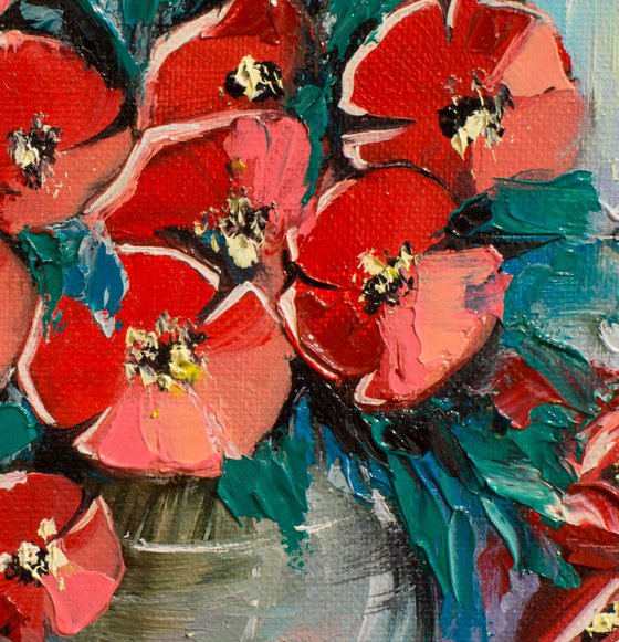 Red poppies in a vase