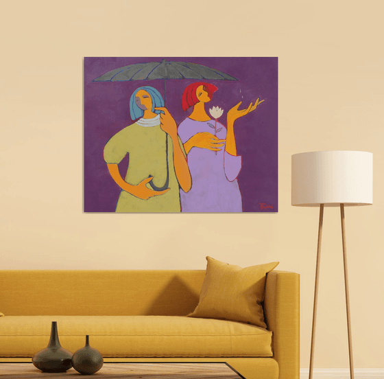 Two under an umbrella.