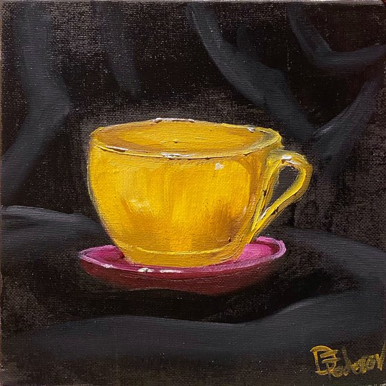 Yellow coffee cup still life