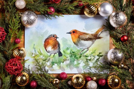 Two Robin birds on a tree