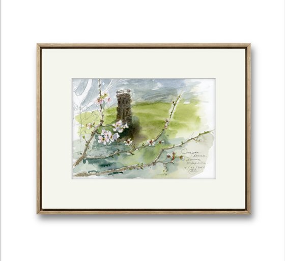 Landscape with an old tower and plum blossoms.