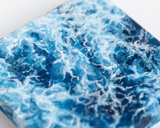 Miniature blue ocean waves