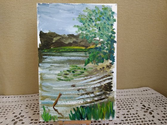 Riverbank on a windy day. Pleinair painting