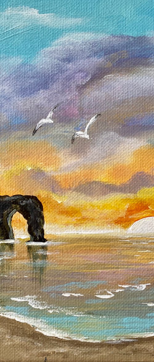 Sunset over Durdle Door by Marja Brown