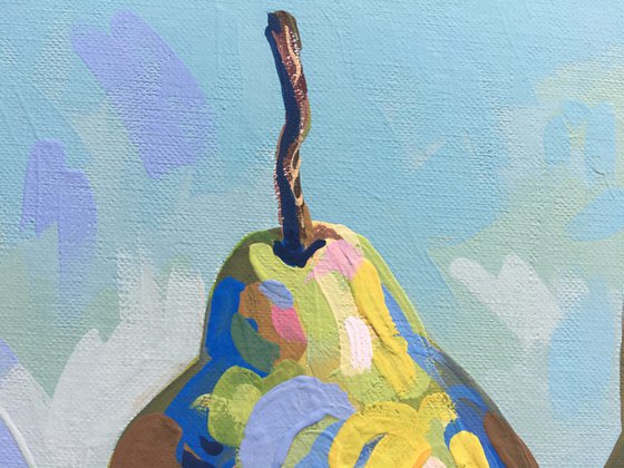 Two pears on a blue background