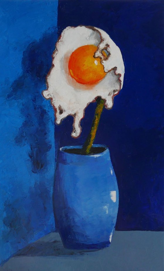 Egg flower in blue vase