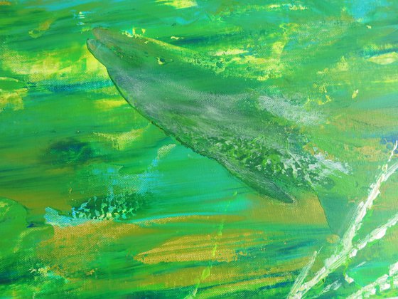 Green dragon chasing dolphin