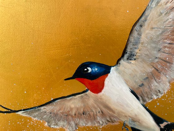 Two Swallows on Gold
