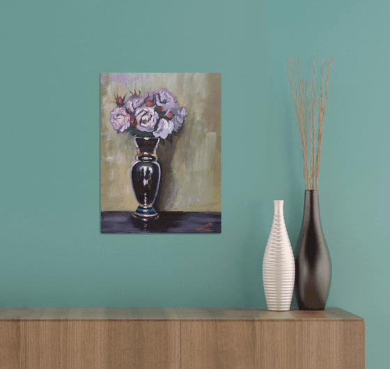 Roses in a glossy vase