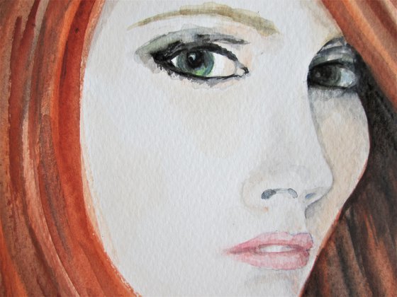 Portrait of woman with red hair